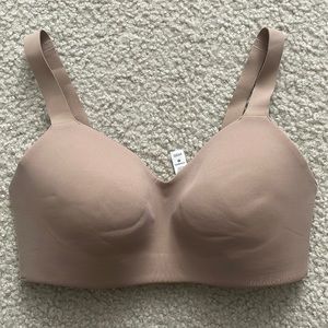 Tan Lululemon sports bra size 34DD